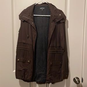 Market Spruce, brown with blue, white dots inside,all buttons/ zippers in tacked